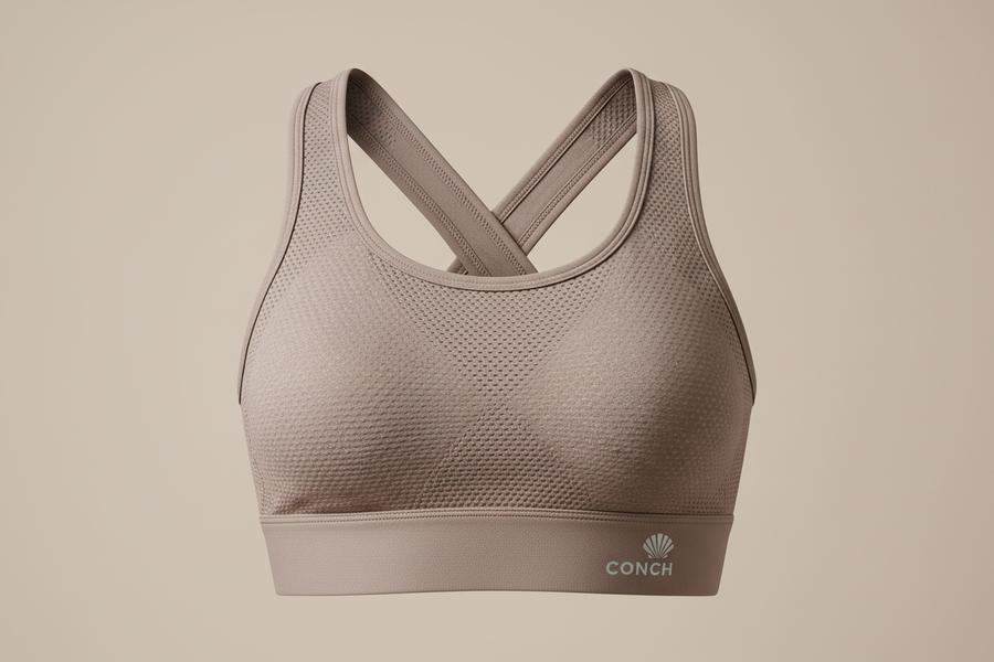Conch Wear Sports Bra front view showing breathable fabric and supportive design for men and women